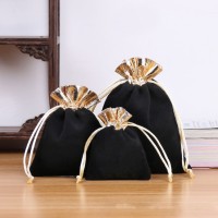 Velvet bag with gold Black